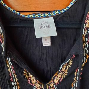 Black, embroidered dress